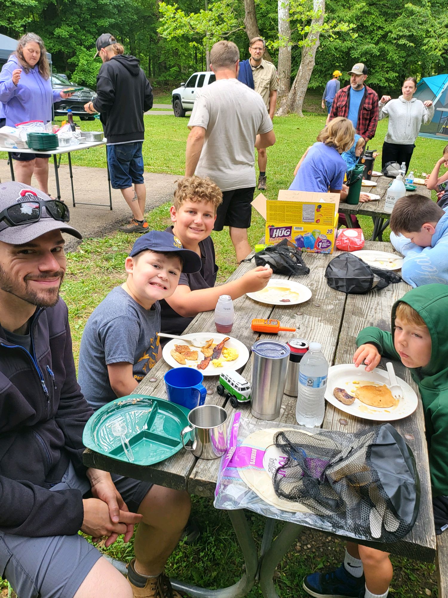 Pack 131 families enjoying breakfast at camp
